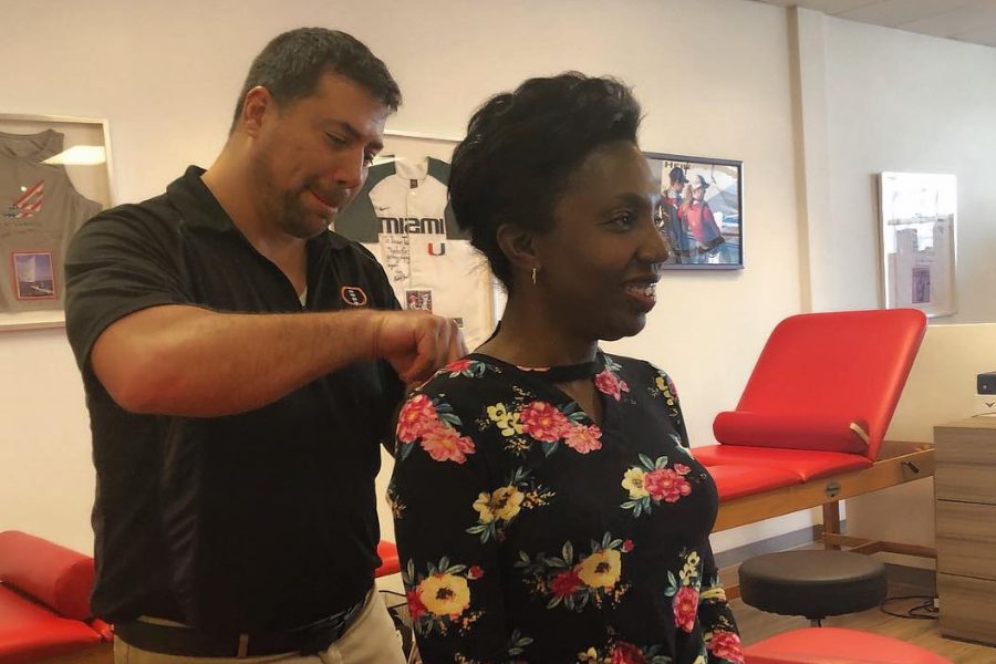 On The Frontlines Of Care: Why Spinal Health Matters For Nurses, Firefighters &Amp; First Responders | Carpe Diem Chiropractic January 22, 2026 “healthcare worker supporting patient, highlighting spinal health awareness