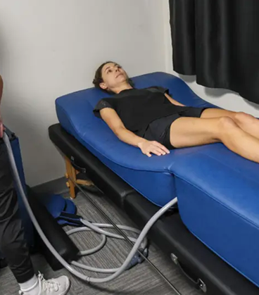 Patient relaxing during recovery-focused therapy to reduce tension and support full-body relief